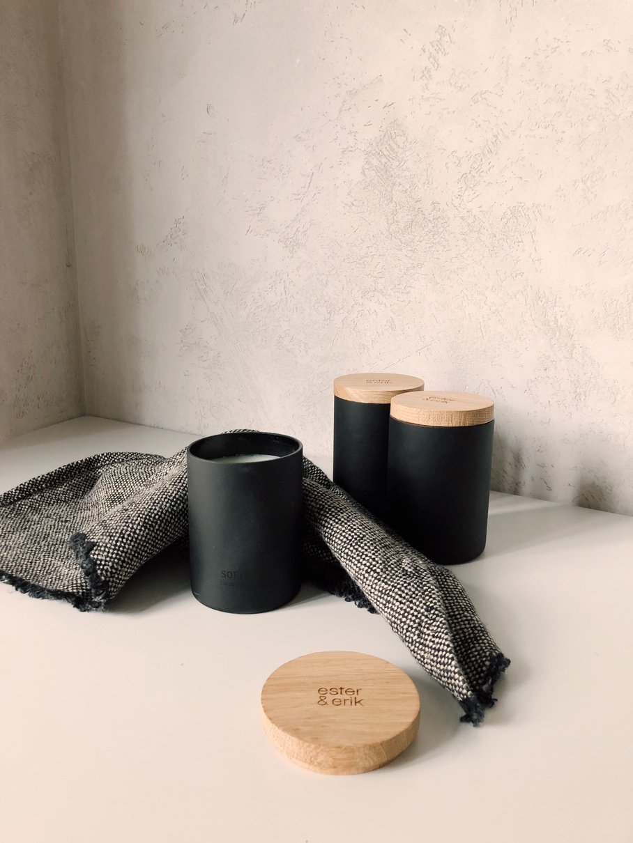 Candles In Black Containers