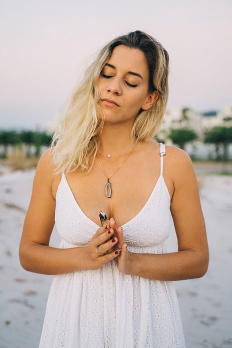 Woman in White Sleeveless Dress